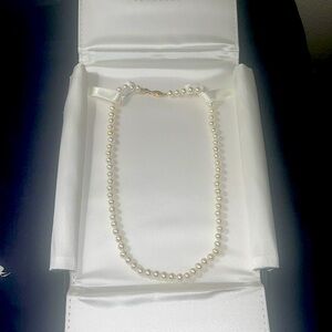 18 inch with 14 karat gold clasp pearl necklace